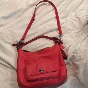 Coral shoulder or cross body bag.